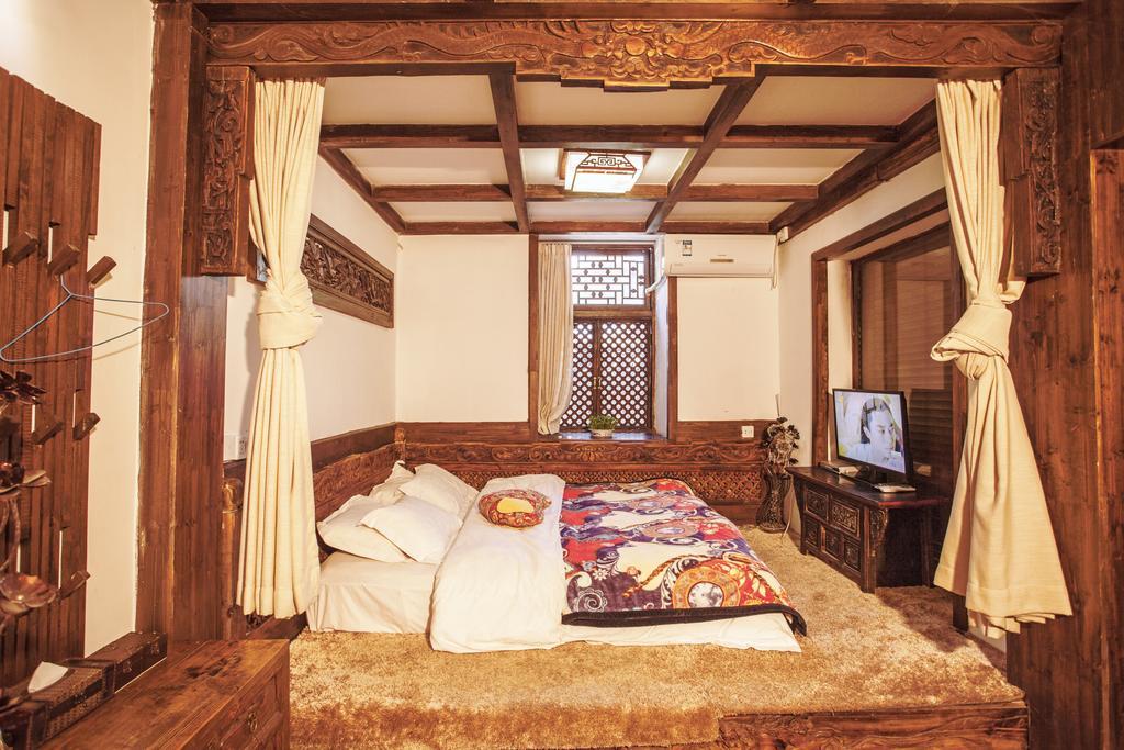 XI Tang Exquisite Hotel Li-ťiang Pokoj fotografie