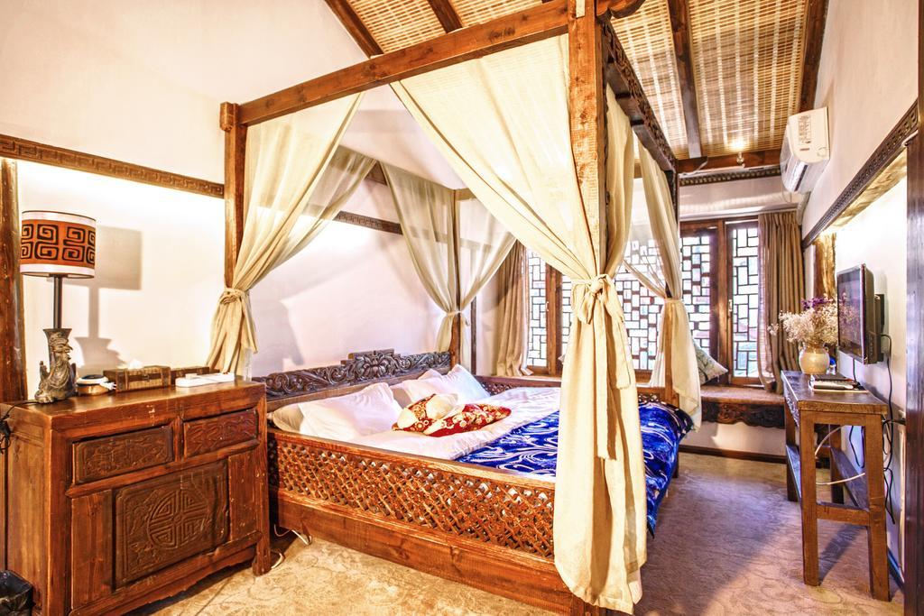 XI Tang Exquisite Hotel Li-ťiang Pokoj fotografie